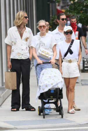 Elsa Hosk  - With boyfriend Tom Daly with their baby having lunch in New York
